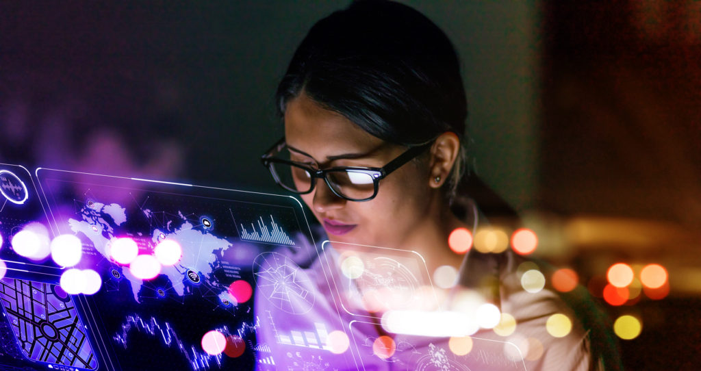 Scientist wearing safety glasses working in a laboratory