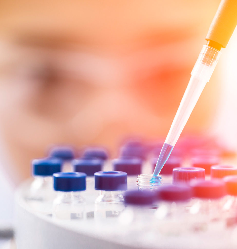 Pipette dispensing liquid into sample vials